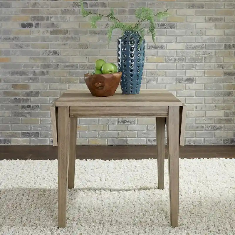 The Gray Barn Sun Valley Sandstone Drop Leaf Table