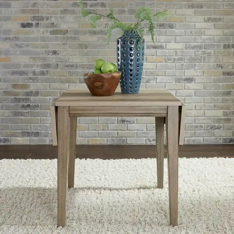 The Gray Barn Sun Valley Sandstone Drop Leaf Table